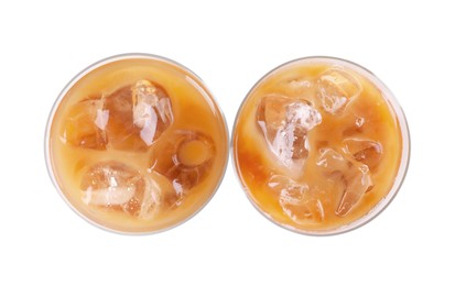 Photo of Glasses of fresh iced coffee isolated on white, top view