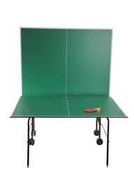 Image of Green ping pong table with racket and ball isolated on white