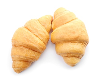 Tasty croissants on white background