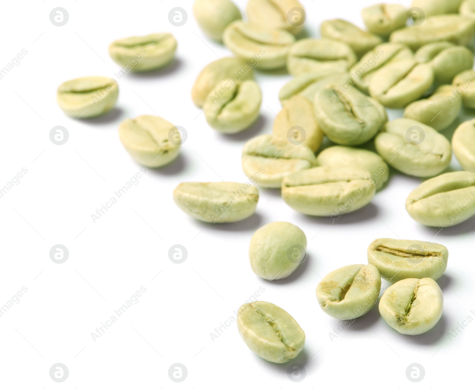 Photo of Green coffee beans on white background, closeup