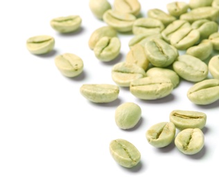 Green coffee beans on white background, closeup