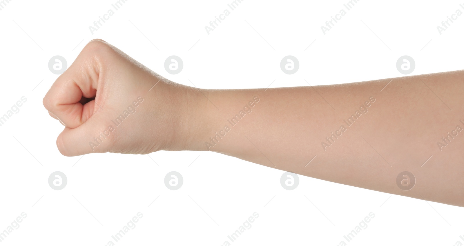 Photo of Playing rock, paper and scissors. Woman showing fist on white background, closeup