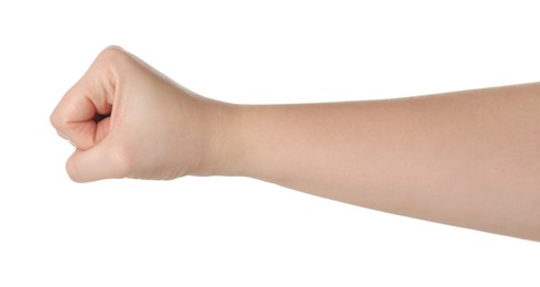 Photo of Playing rock, paper and scissors. Woman showing fist on white background, closeup