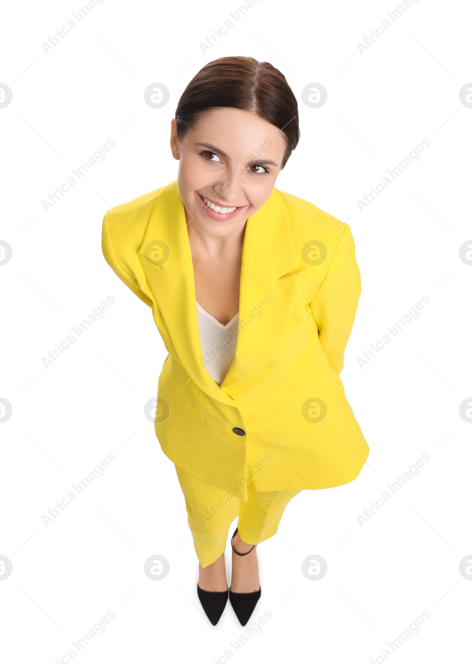 Photo of Beautiful businesswoman in yellow suit on white background, above view