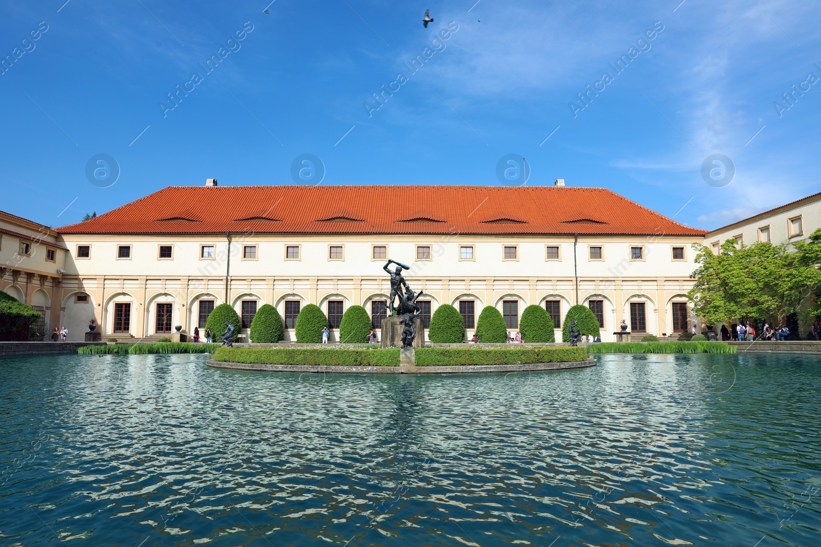 Photo of PRAGUE, CZECH REPUBLIC - APRIL 25, 2019: Pond with statues in garden of Wallenstein Palace