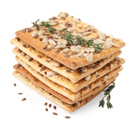 Photo of Stack of cereal crackers with flax, sunflower, sesame seeds and thyme isolated on white