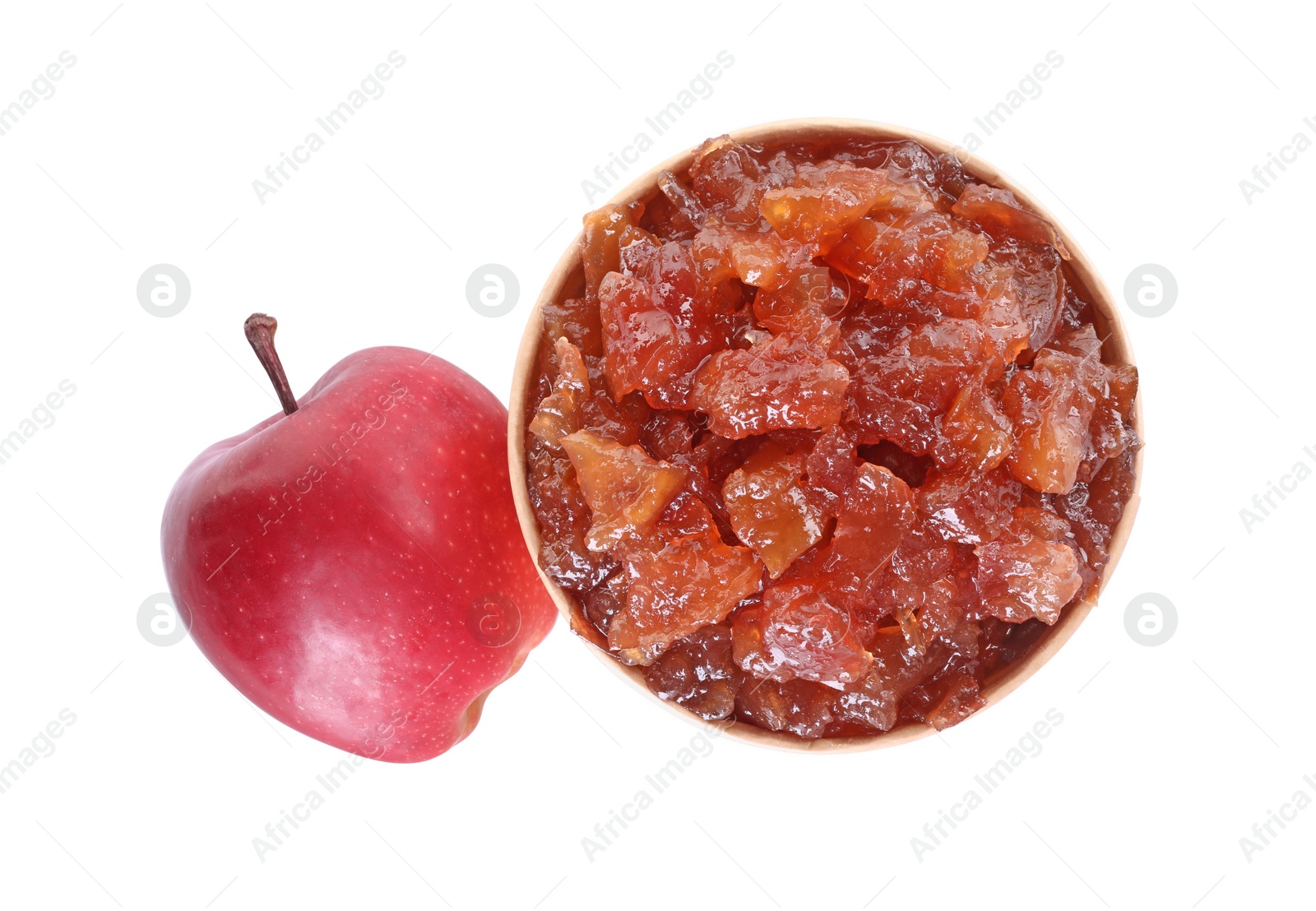 Photo of Delicious apple jam in paper cup and fresh fruit isolated on white, top view