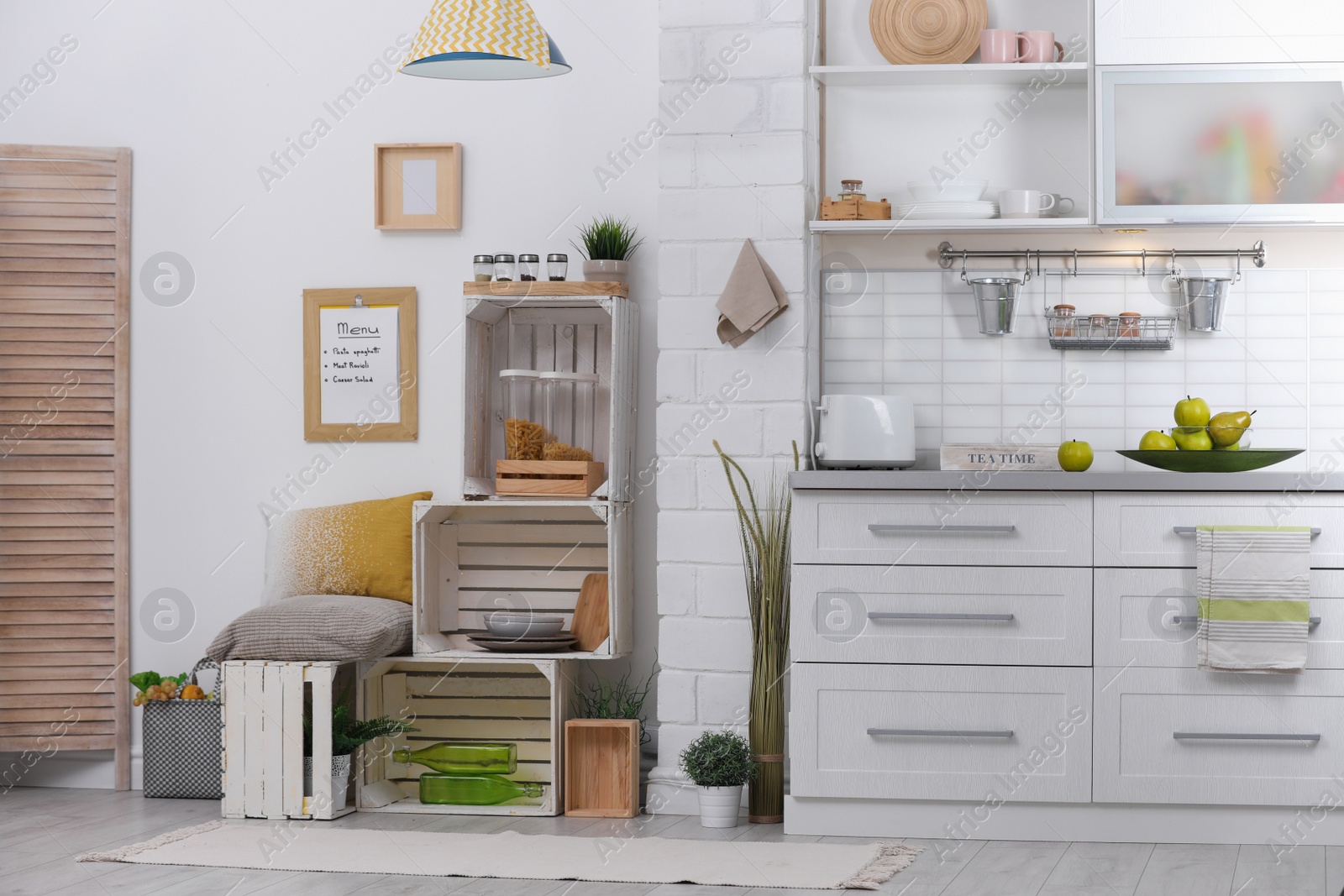 Photo of Modern kitchen interior with wooden crates as eco furniture