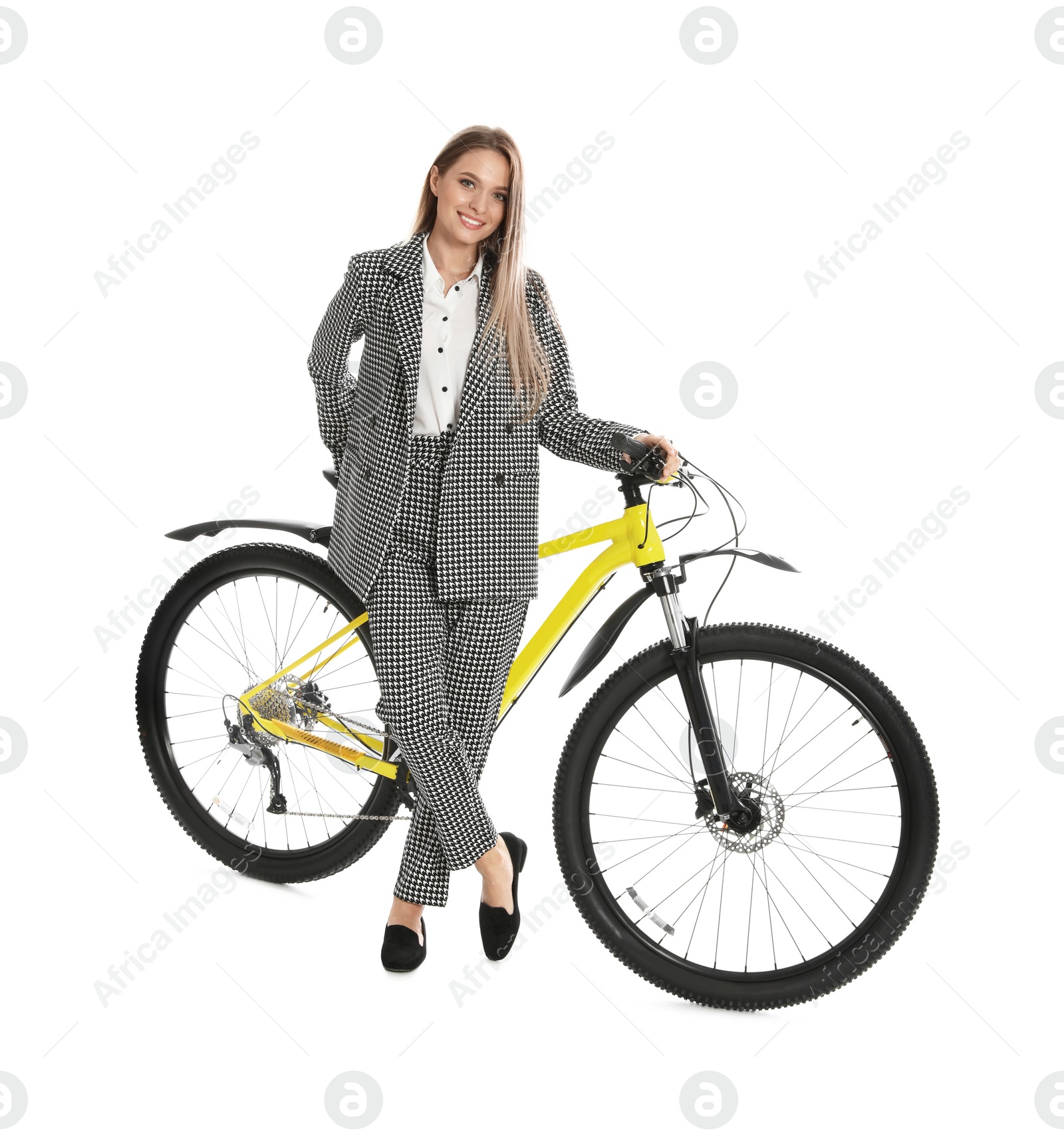 Photo of Young businesswoman with bicycle on white background