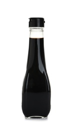 Photo of Bottle with balsamic vinegar on white background