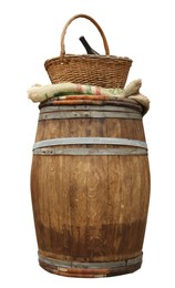 Image of One wooden barrel and wicker basket with bottle of wine isolated on white