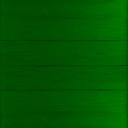 Image of St. Patrick day. Green wooden surface as background