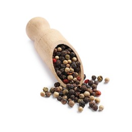 Photo of Aromatic spices. Different peppers and wooden scoop isolated on white