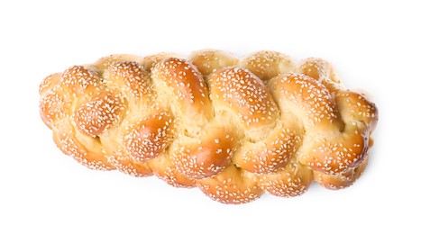 Photo of Homemade braided bread with sesame seeds isolated on white, top view. Traditional Shabbat challah