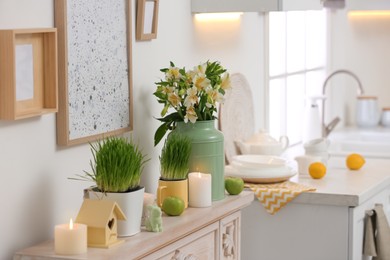 Photo of Decorative fireplace with modern furniture in kitchen. Interior design
