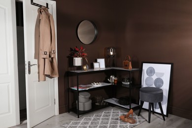 Photo of Hallway interior with console table and stylish decor