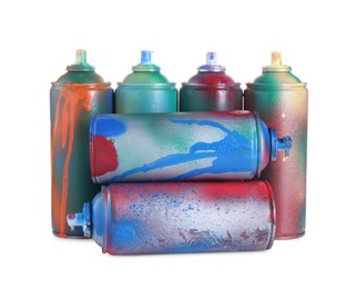 Photo of Many spray paint cans isolated on white