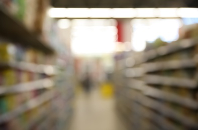 Photo of Blurred view of modern supermarket interior