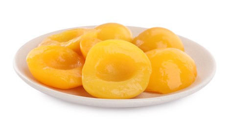Photo of Halves of canned peaches on white background