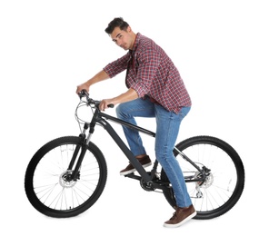 Photo of Handsome young man with modern bicycle on white background