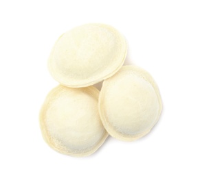 Photo of Frozen raw dumplings on white background, top view