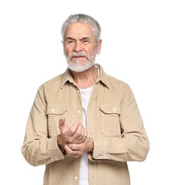 Photo of Arthritis symptoms. Man suffering from pain in wrist on white background