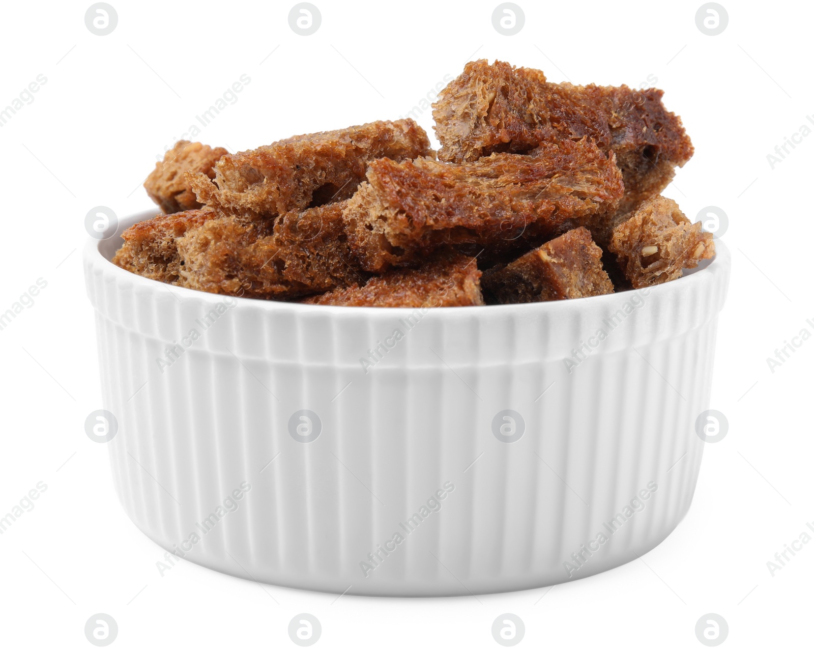 Photo of Bowl of crispy rusks isolated on white