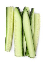 Photo of Pieces of fresh cucumber isolated on white, top view