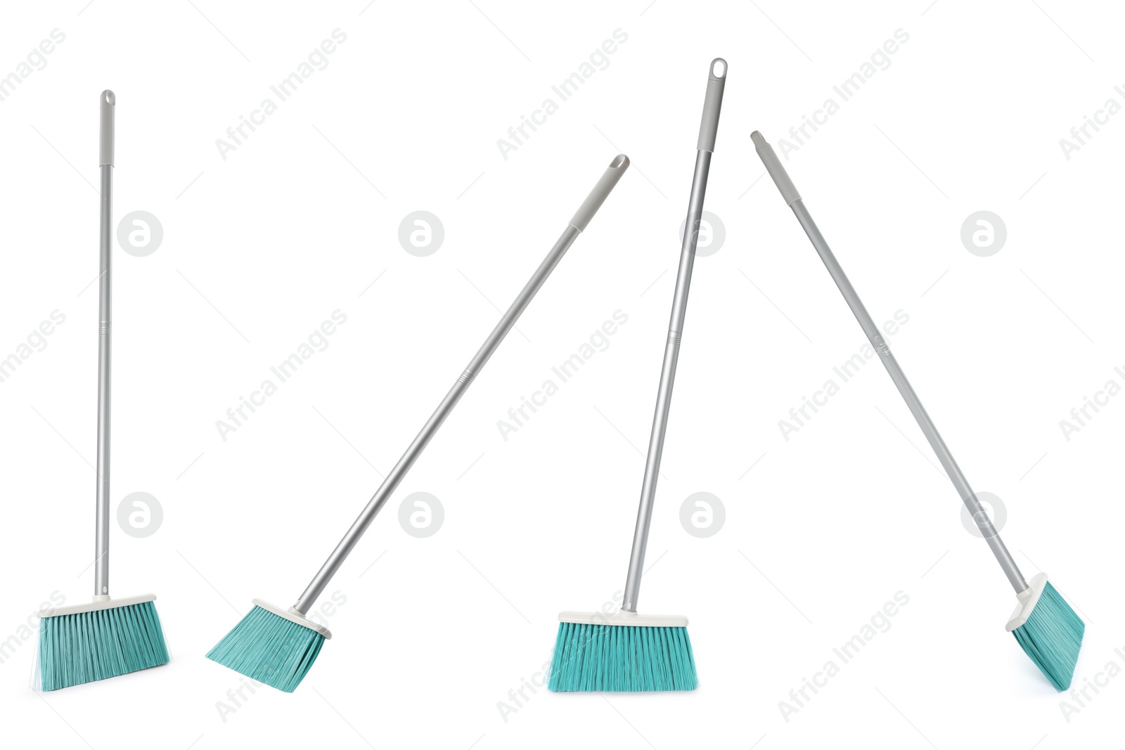 Image of Set with plastic brooms on white background