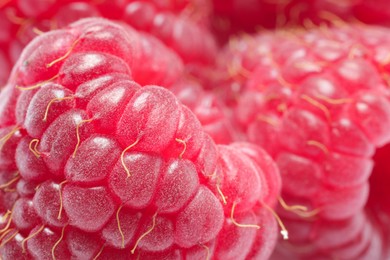 Tasty fresh ripe raspberries as background, macro view. Fresh berries