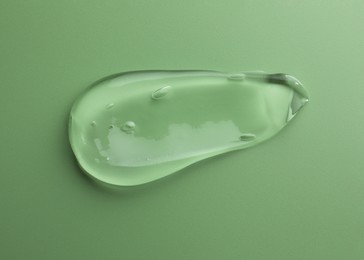 Sample of gel on green background, top view