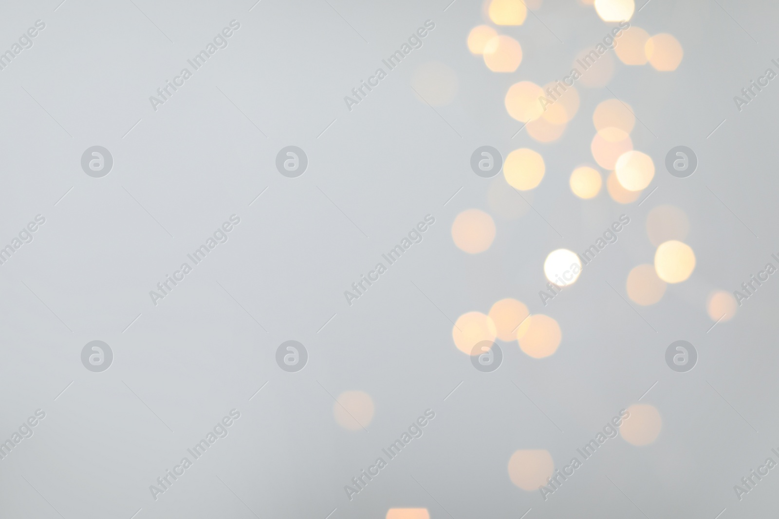 Photo of Blurred view of beautiful lights, space for text. Bokeh effect