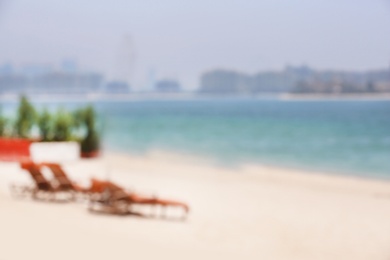 Blurred view of tropical resort on sunny day