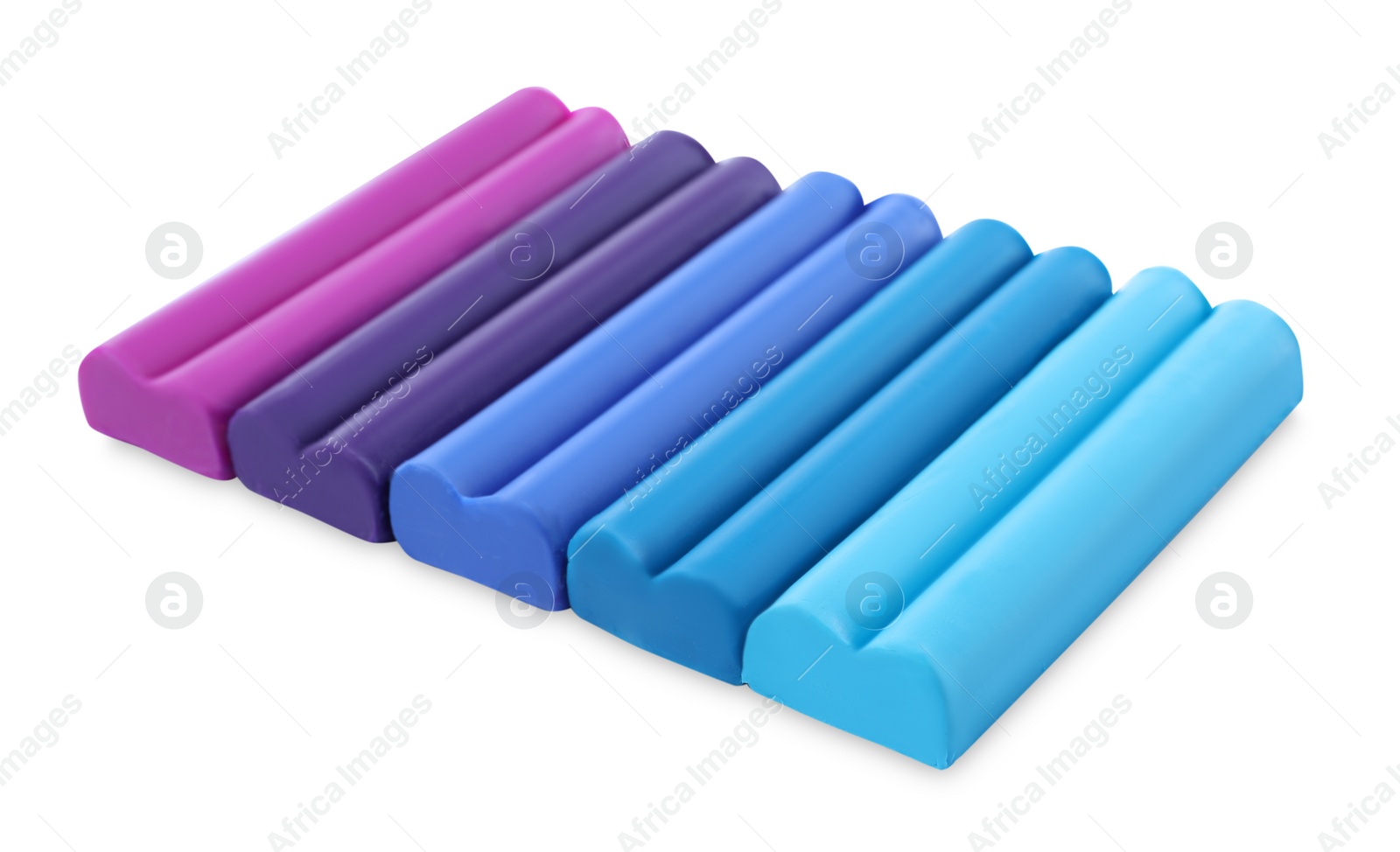 Photo of Many different colorful plasticine pieces on white background