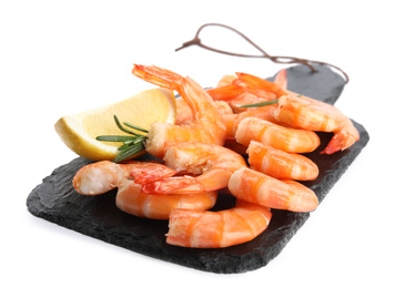 Photo of Delicious cooked shrimps served with lemon and rosemary on white background