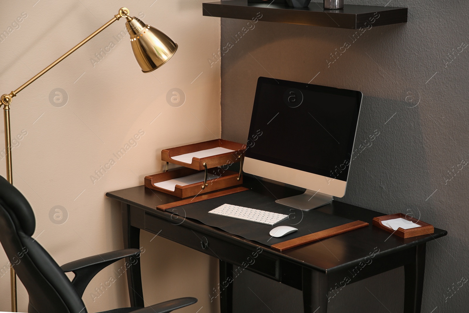 Photo of Modern interior of working place with computer