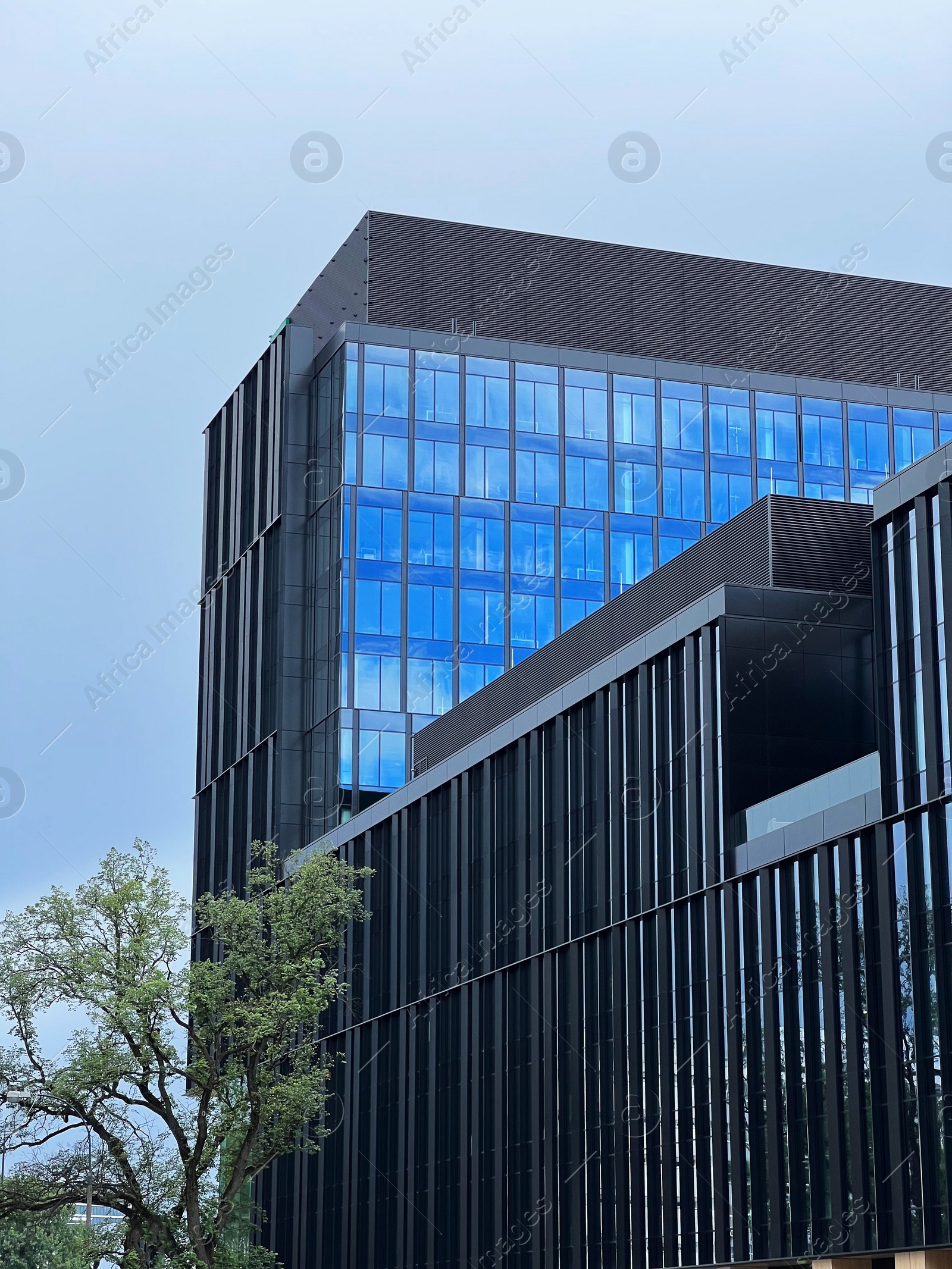 Photo of Exterior of modern building against blue sky