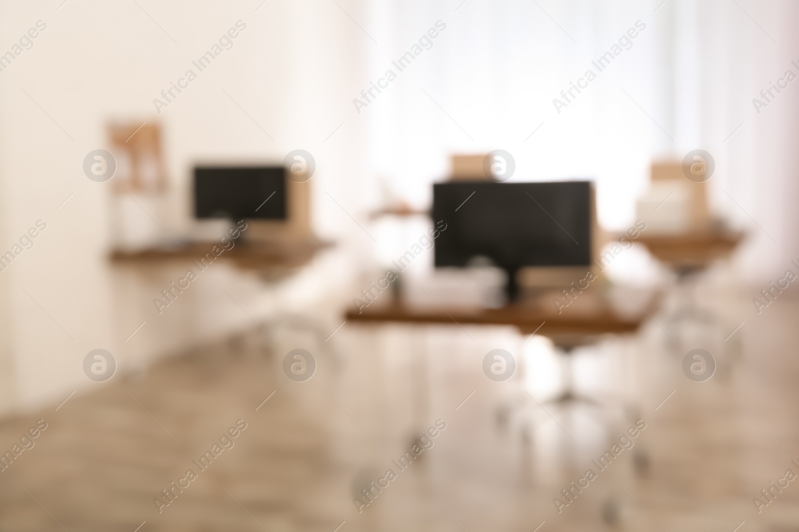 Photo of Modern brightly lit office with bokeh effect