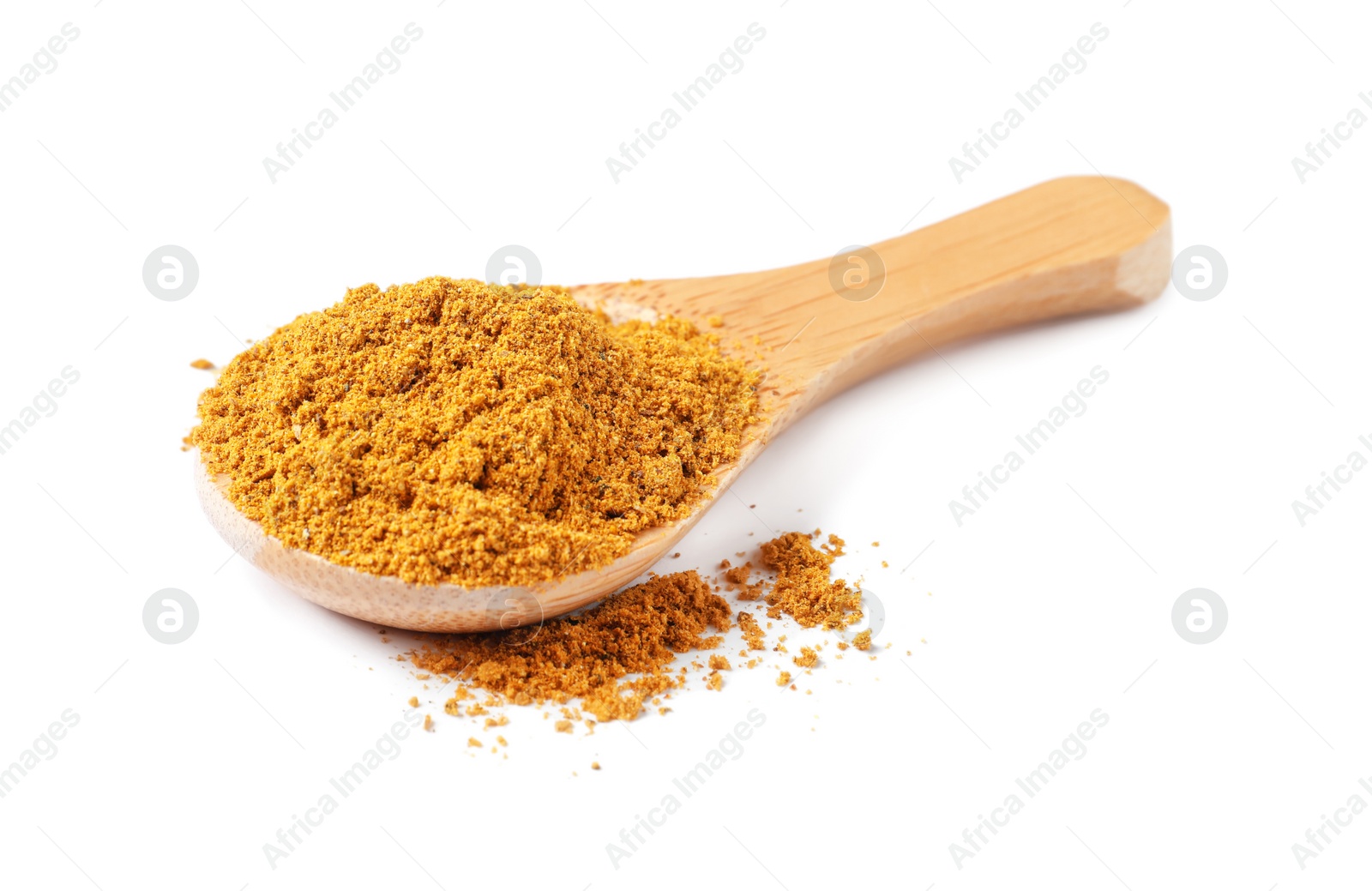 Photo of Spoon with dry curry powder isolated on white