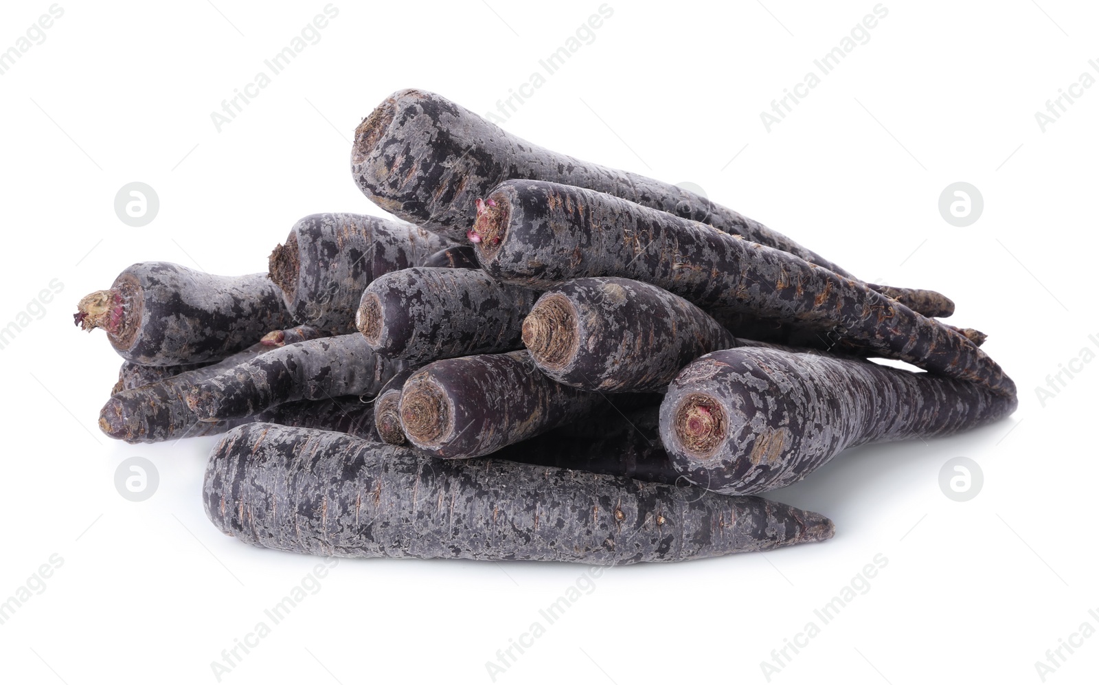 Photo of Fresh raw black carrots isolated on white