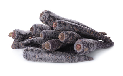 Fresh raw black carrots isolated on white