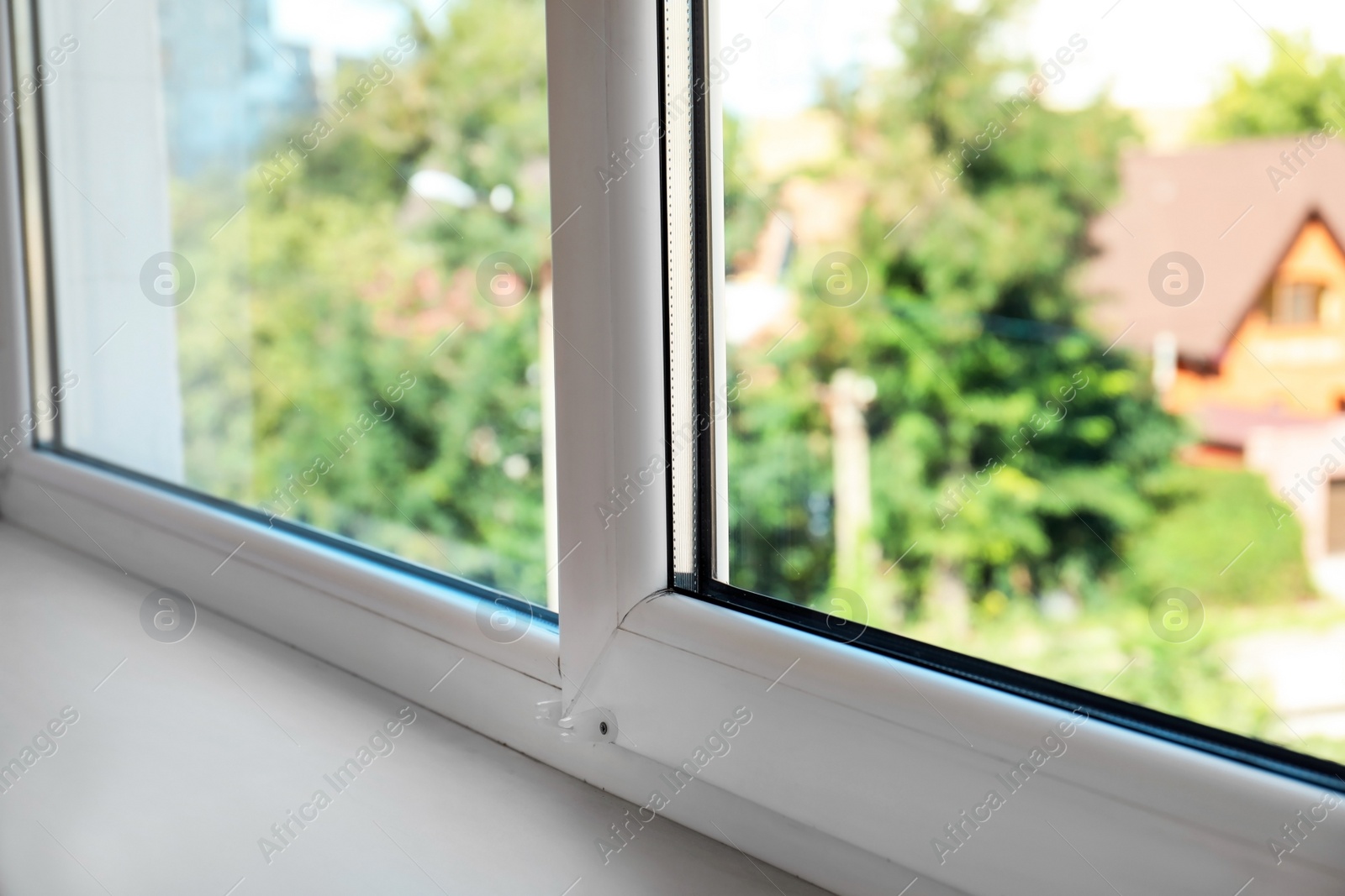 Photo of Modern window in room, closeup view. Home interior