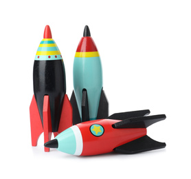 Bright modern toy rockets isolated on white. Back to school