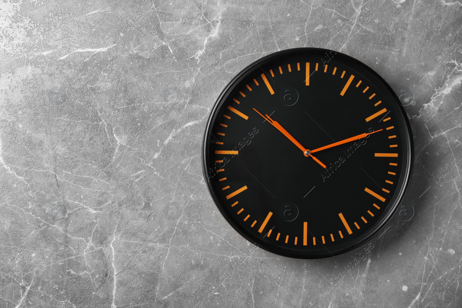 Photo of Modern clock on grey background, top view. Time management