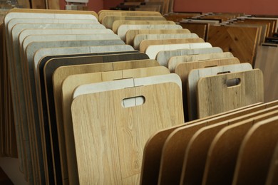 Photo of Many different samples of wooden flooring in store