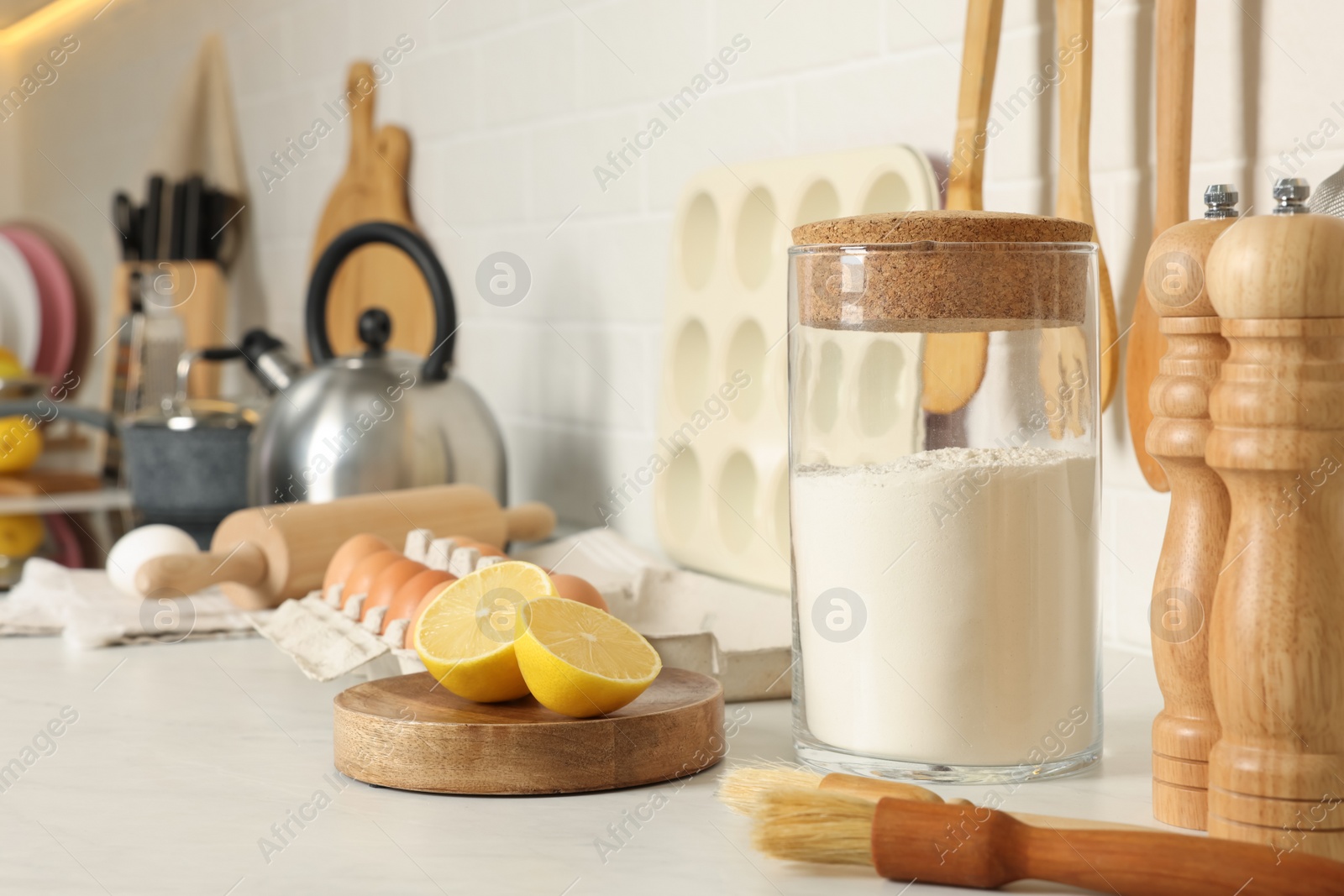 Photo of Countertop with cooking utensils and products in kitchen