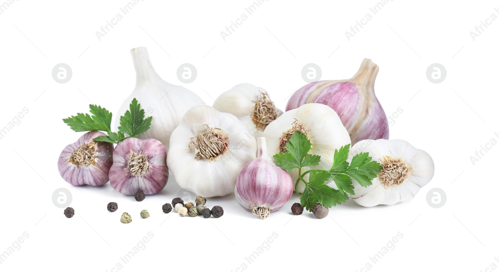 Photo of Fresh garlic heads and spices isolated on white