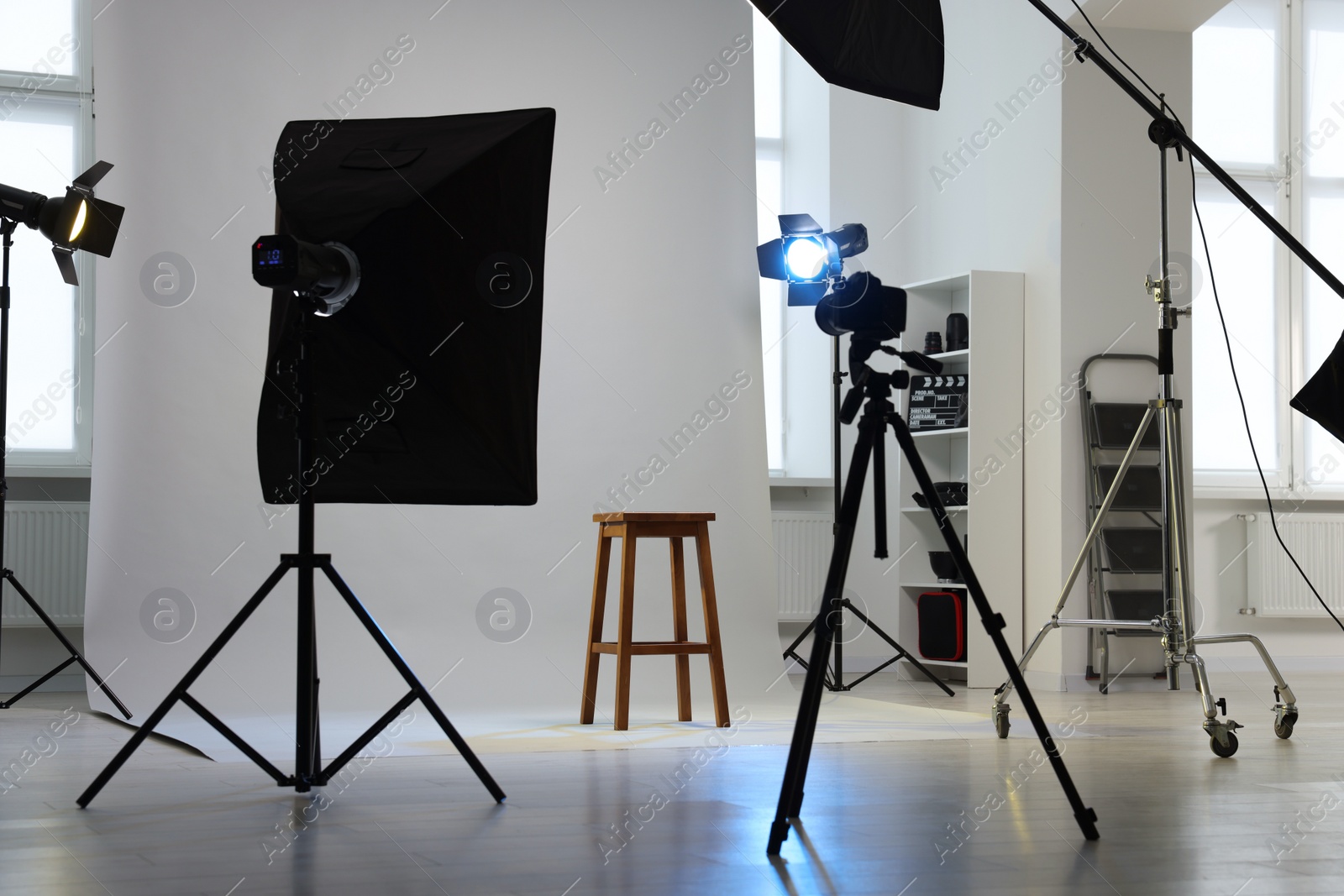 Photo of Stool, camera and different equipment for casting in studio