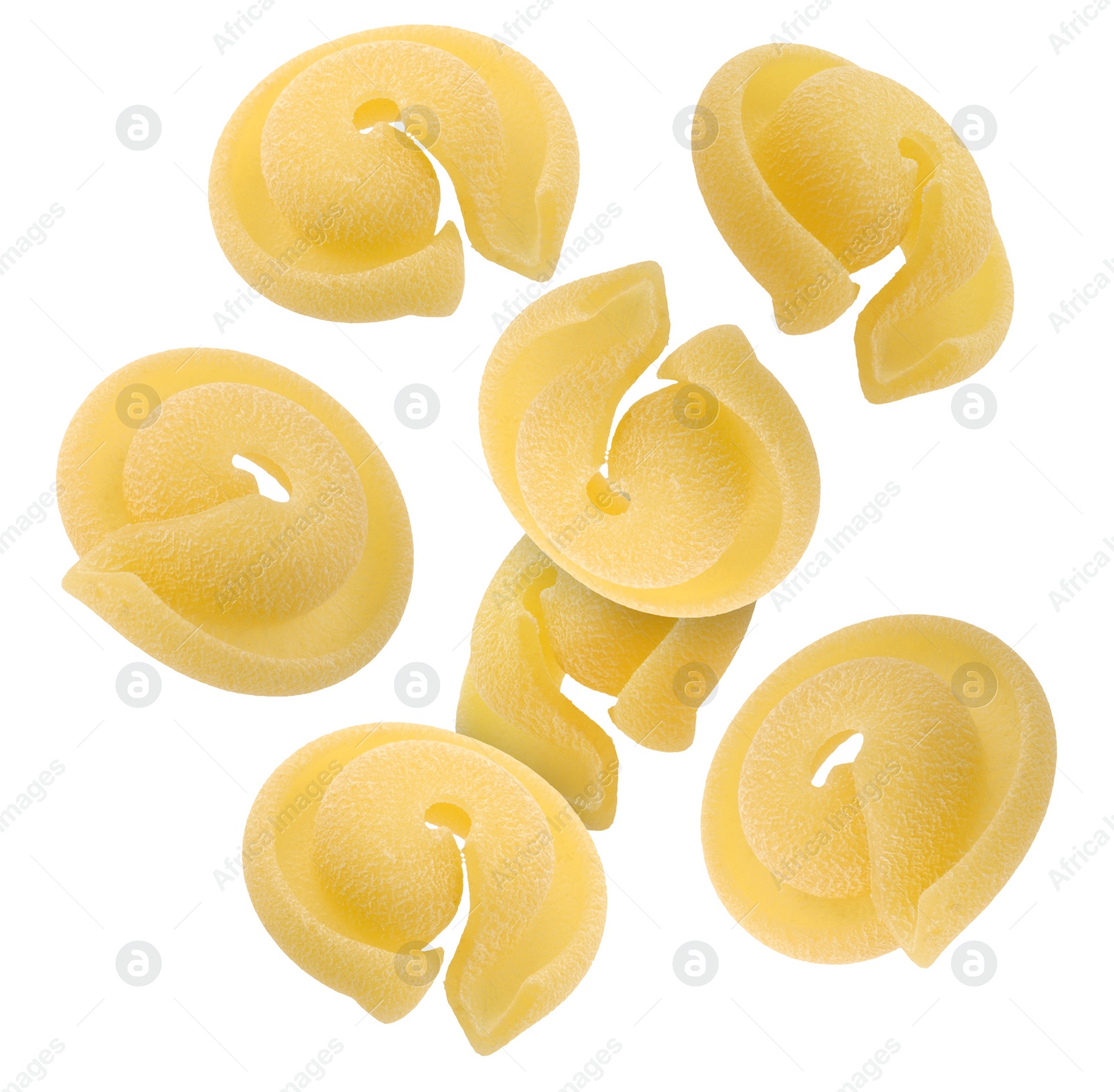 Image of Raw dischi volanti pasta flying on white background