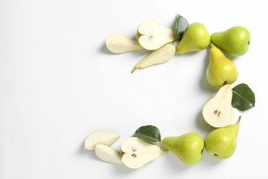 Frame made of pears on white background, top view